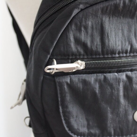 Magellan Black Anti-Theft Locking Zippers Slash-Resistant Nylon Mini Backpack - Picture 4 of 13